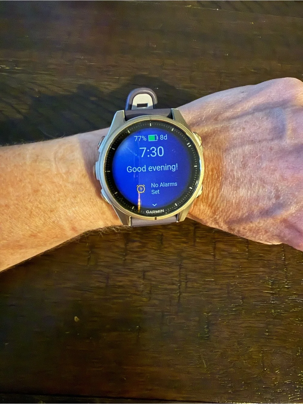 garmin Fēnix 8 smartwatch with purple strap - AMOLED display